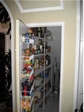 Extra storage shelving in the large walk-in pantry where desired in this Monmouth County, Monmouth Beach, NJ home